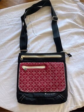 Sherpani Black and Red Quilted Travel Crossbody Bag Purse with Multiple Pockets